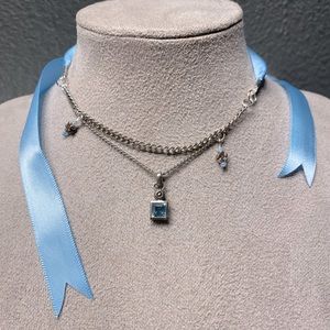 STERLING SILVER AND BLUE TOPAZ and silver tone choker with satin ribbon self tie